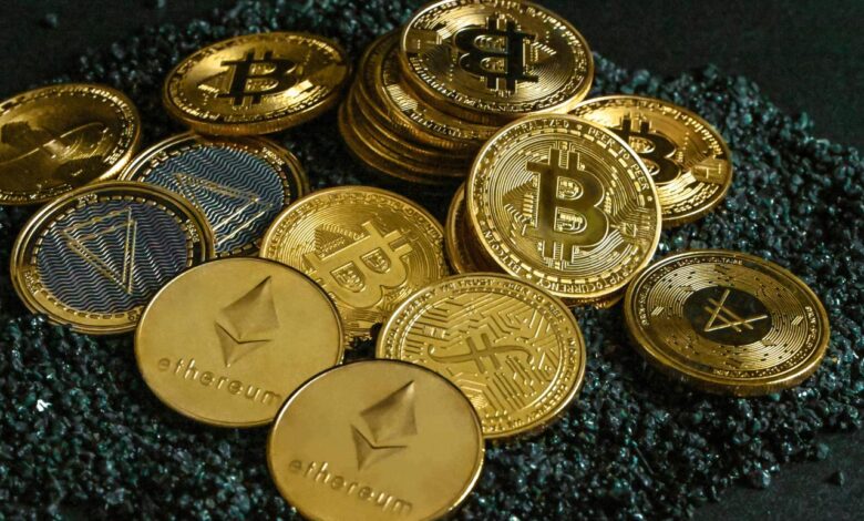 a pile of gold and silver bitcoins