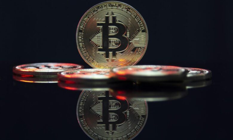 a bit coin sitting on top of a table